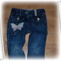 Spodnie jeansy z motylkiem Next 98
