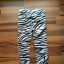 H&M legginsy spodnie zebra 122 6 7 lat